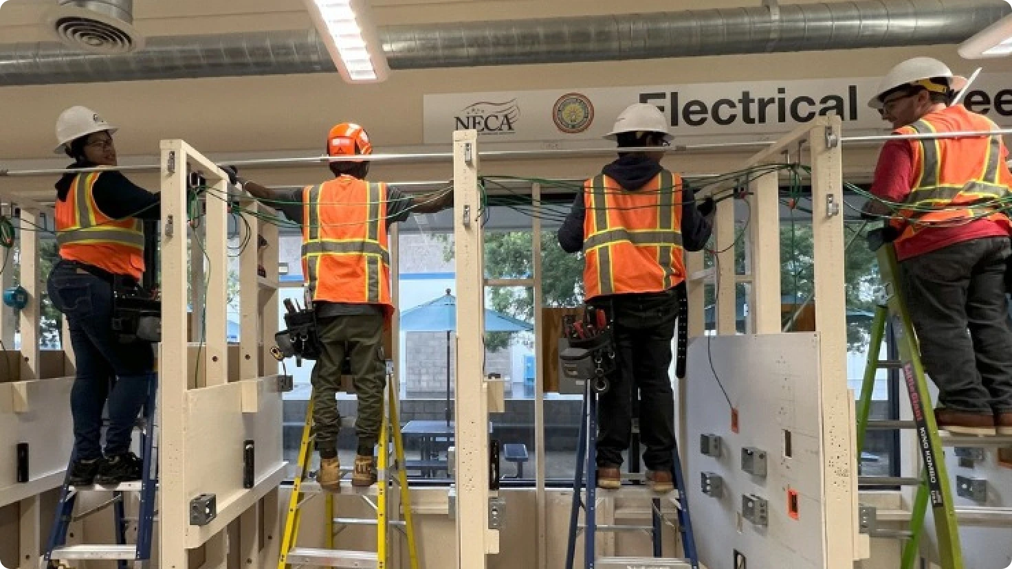 Electrical Workers At Training